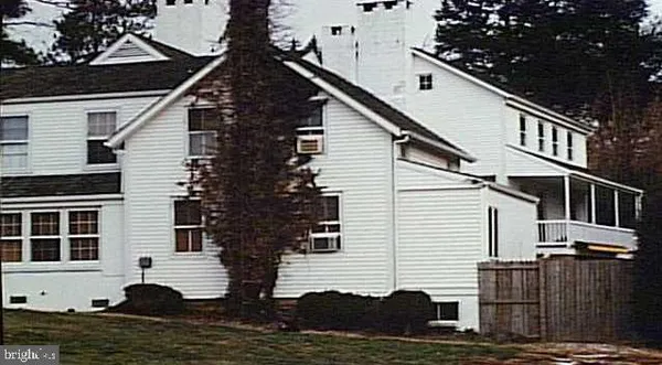 a front view of house with street