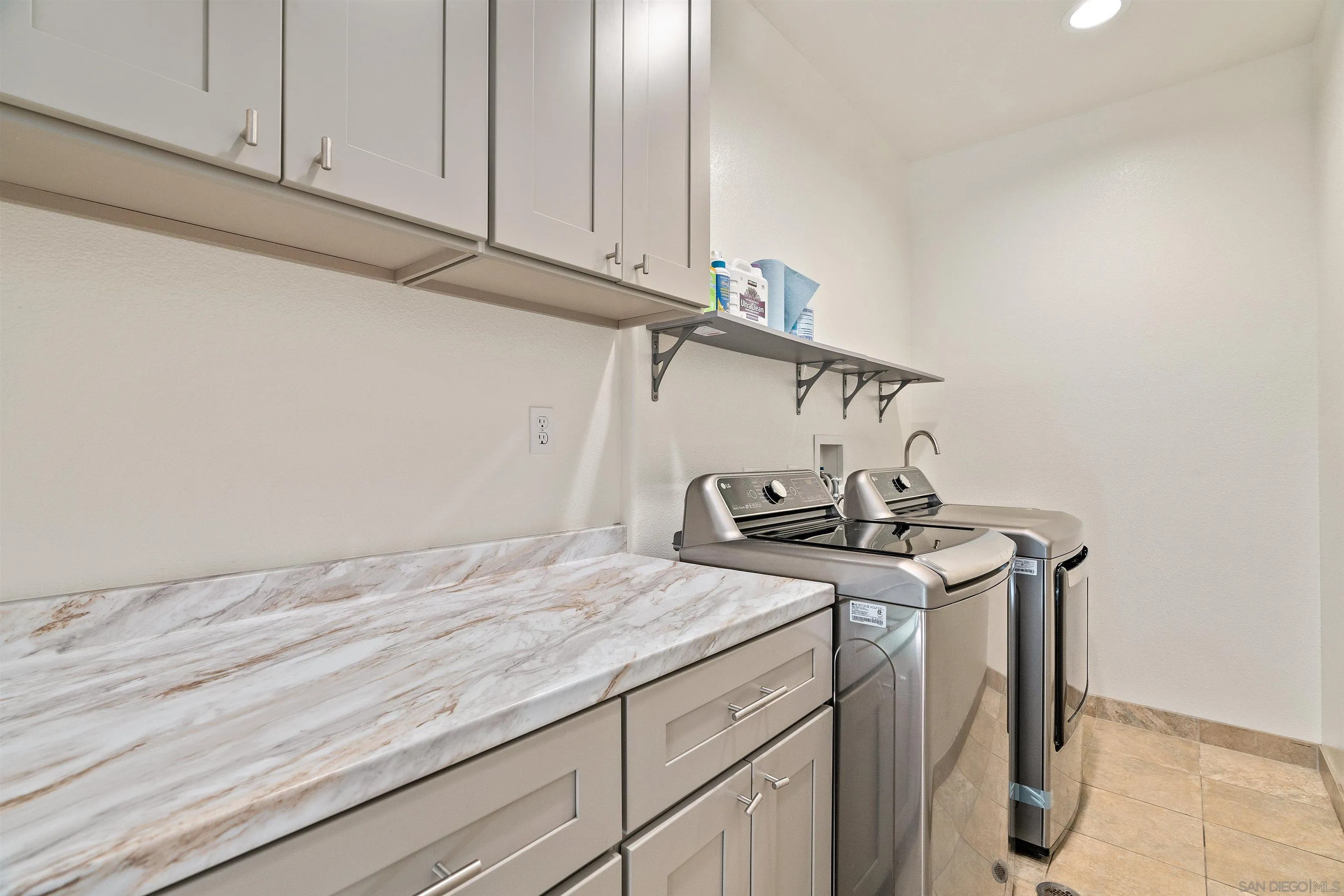 11338 Village Ridge Road San Diego, CA 92131 - Photo 8 of 15 a view of a storage and utility room with cabinets