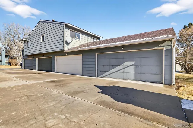 a front view of a house with a garage