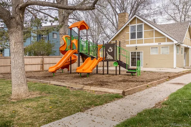 a view of a house with basketball court
