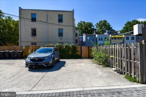 a car parked in front of a house