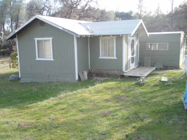 8768 Big Foot Road Igo, CA 96047 - Photo 28 of 41 a front view of house with yard
