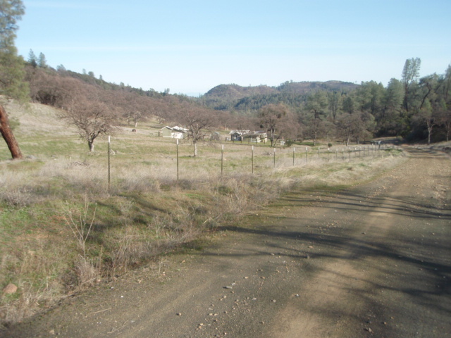 8768 Big Foot Road Igo, CA 96047 - Photo 7 of 41 a view of a lake with mountains in the background