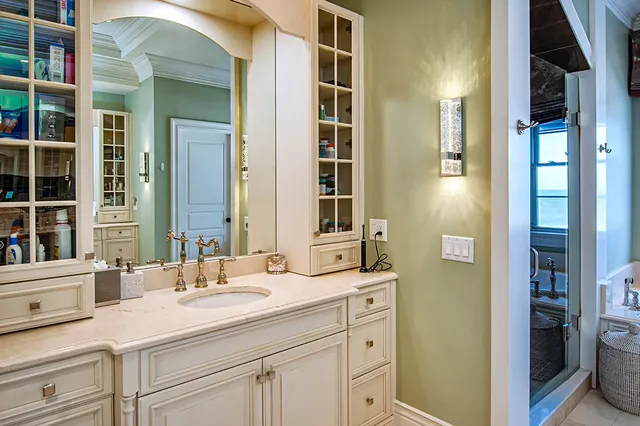 a bathroom with a sink and a mirror