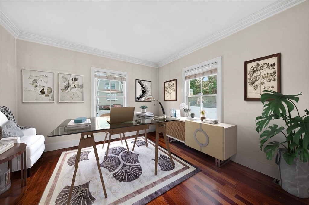 12 Quentin Street Milton, MA 02186 - Photo 25 of 41 a living room with furniture potted plant wooden floor and window