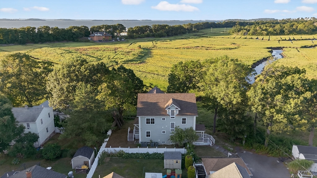 12 Quentin Street Milton, MA 02186 - Photo 40 of 41 an aerial view of residential houses with outdoor space and river