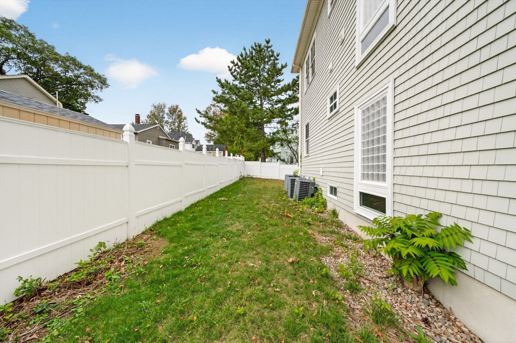 12 Quentin Street Milton, MA 02186 - Photo 41 of 41 a view of a backyard with plants