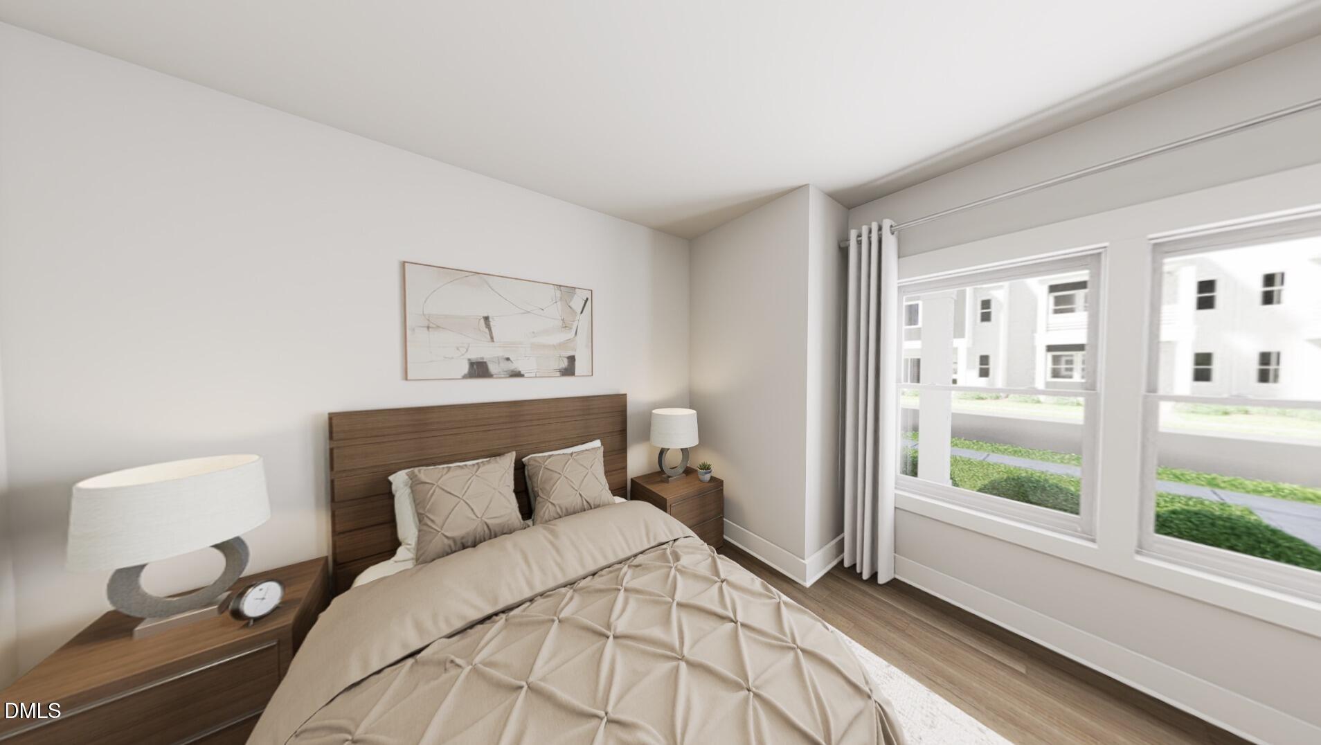 1163 Lamplighter Drive Raleigh, NC 27604 - Photo 12 of 24 a bedroom with a bed and a large window