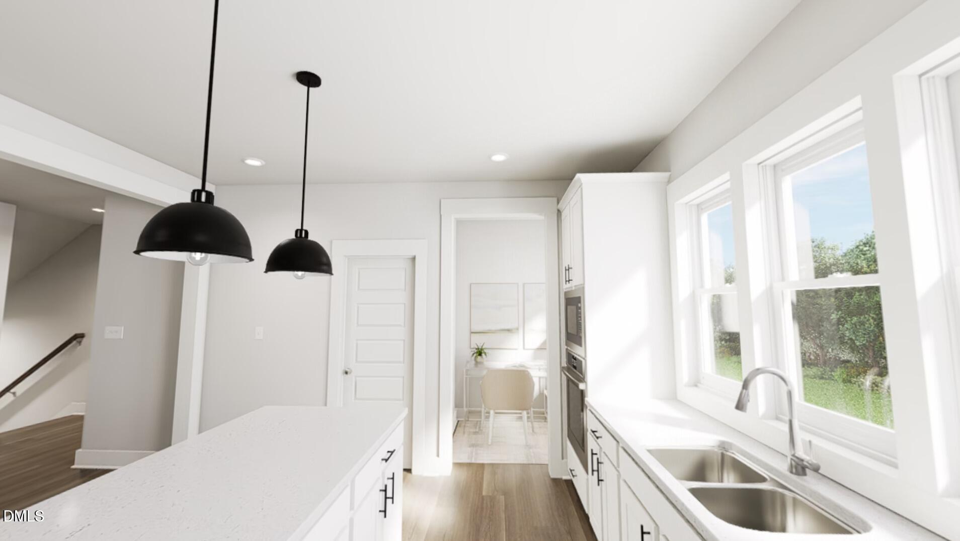 1163 Lamplighter Drive Raleigh, NC 27604 - Photo 5 of 24 a bathroom with a tub sink and a window