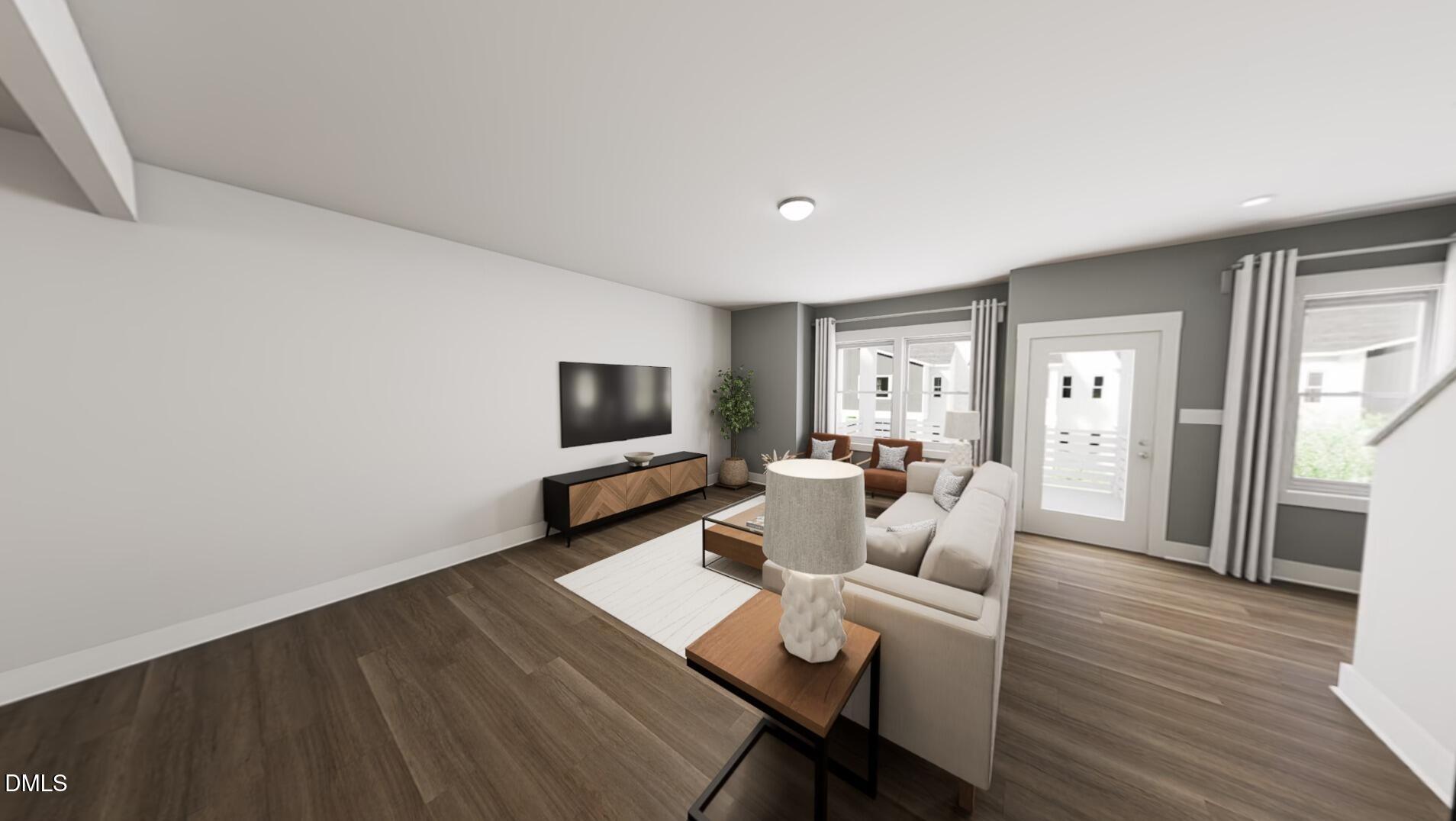 1163 Lamplighter Drive Raleigh, NC 27604 - Photo 7 of 24 a living room with furniture and a flat screen tv