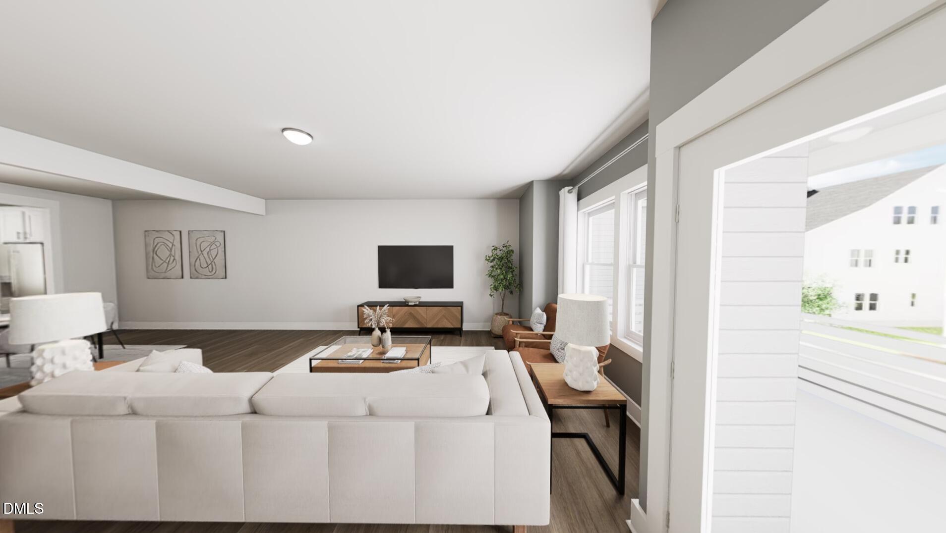 1163 Lamplighter Drive Raleigh, NC 27604 - Photo 8 of 24 a bedroom with a bed a couch and a window