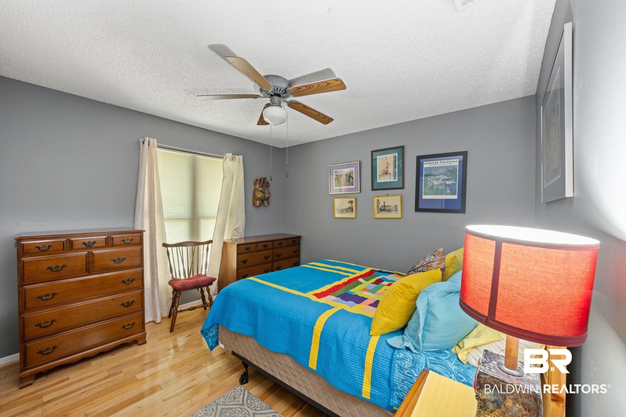 40 Caisson Trace Daphne, AL 36527 - Photo 19 of 54 Bedroom with hardwood / wood-style flooring, and ceiling fan