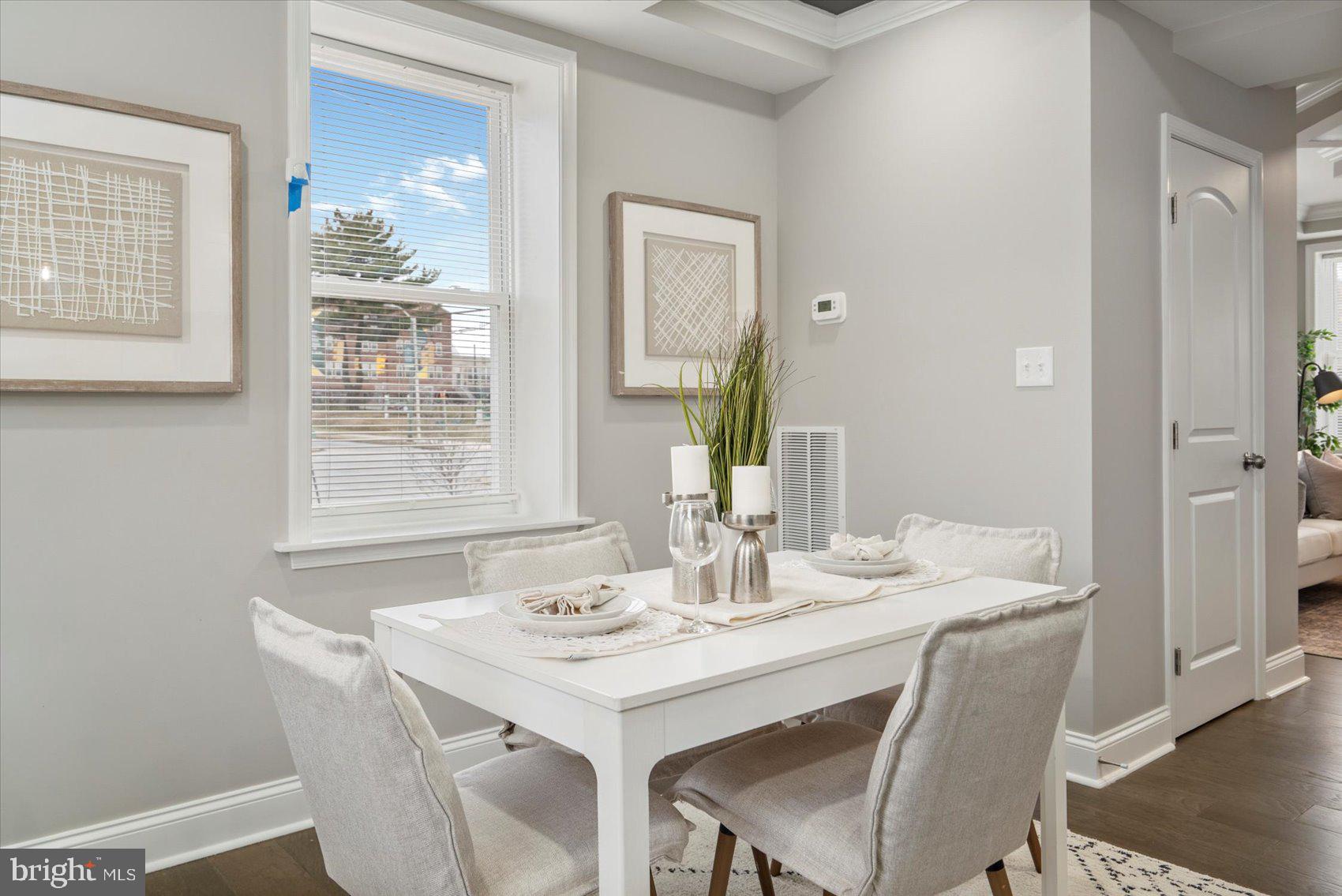 2901 Edison Highway Baltimore, MD 21213 - Photo 12 of 52 a dining room with furniture and window