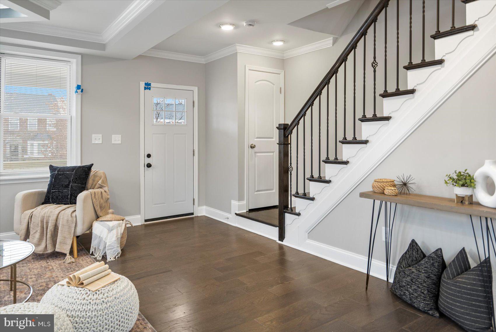 2901 Edison Highway Baltimore, MD 21213 - Photo 15 of 52 a living room with furniture and stairs