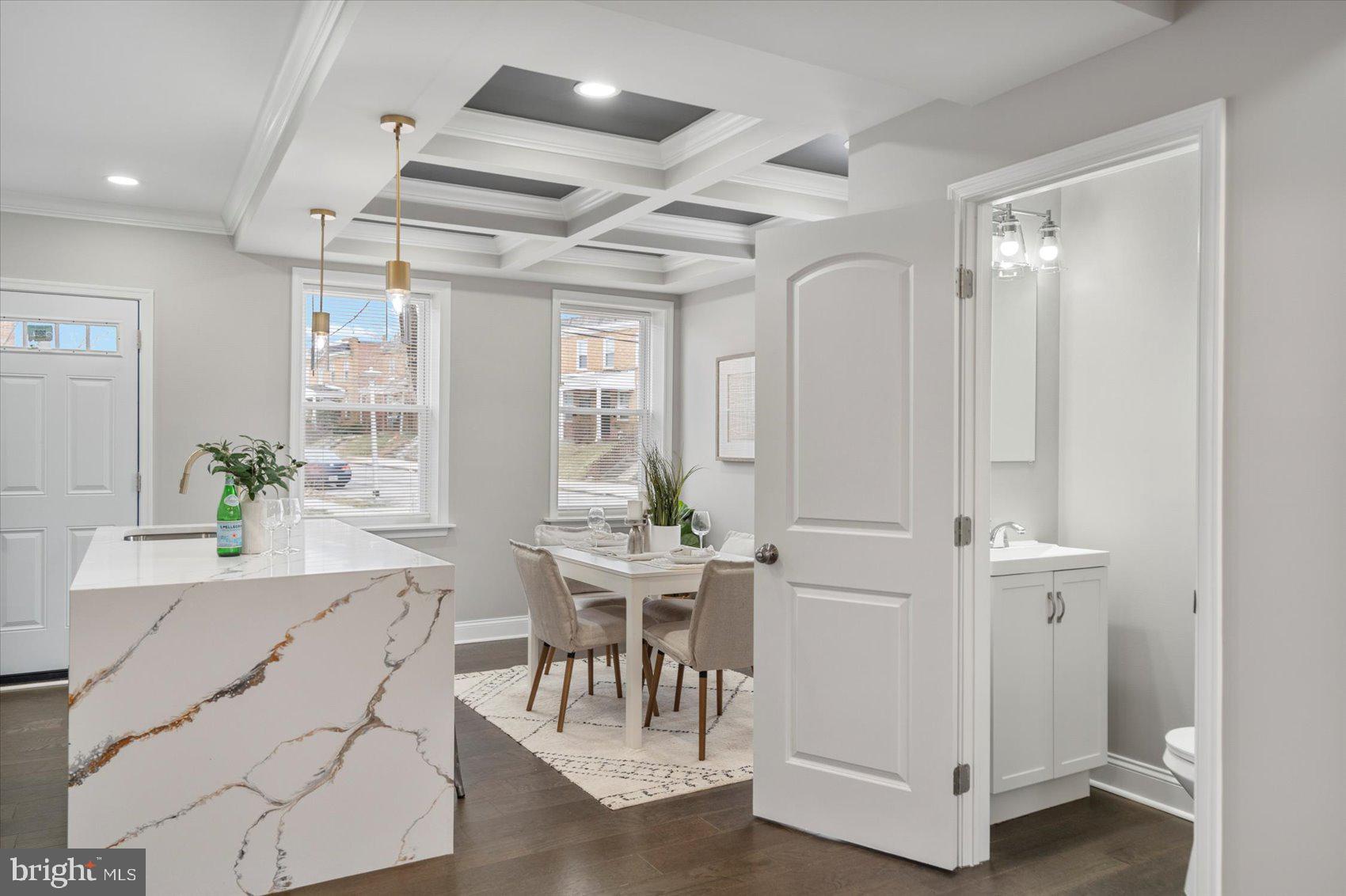 2901 Edison Highway Baltimore, MD 21213 - Photo 16 of 52 a view of a dining room with furniture window and wooden floor