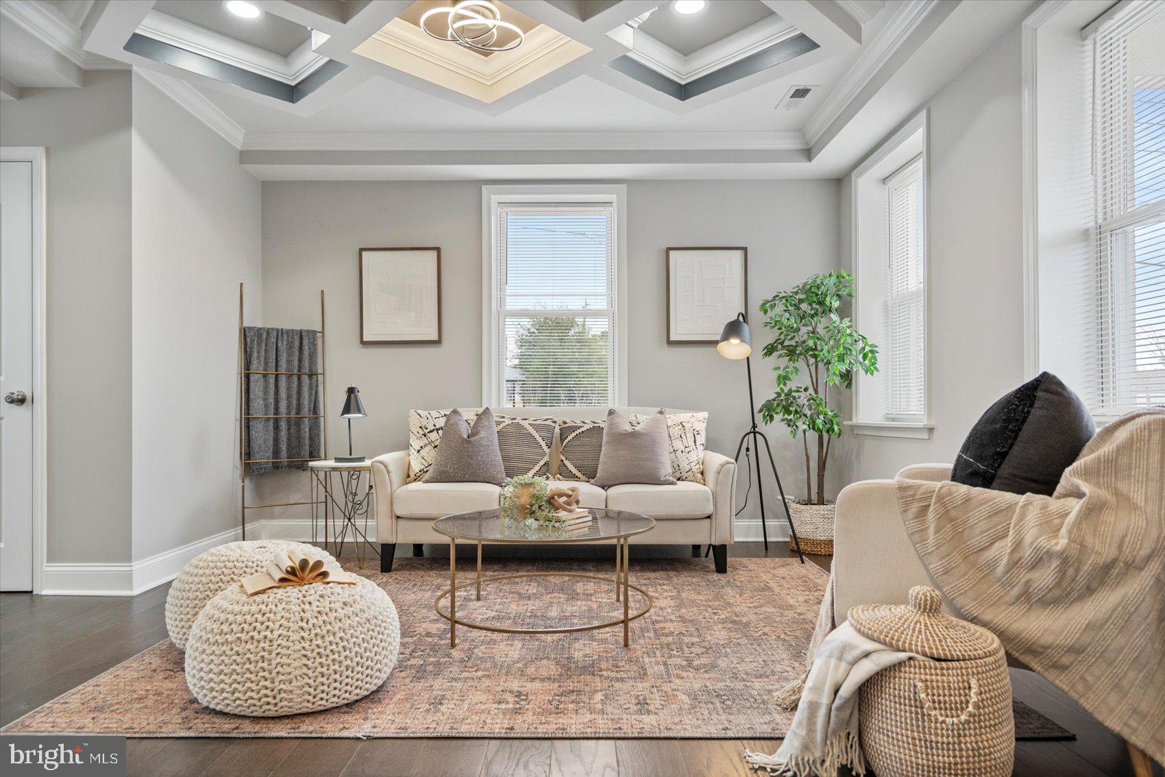 2901 Edison Highway Baltimore, MD 21213 - Photo 2 of 52 a living room with furniture and a potted plant