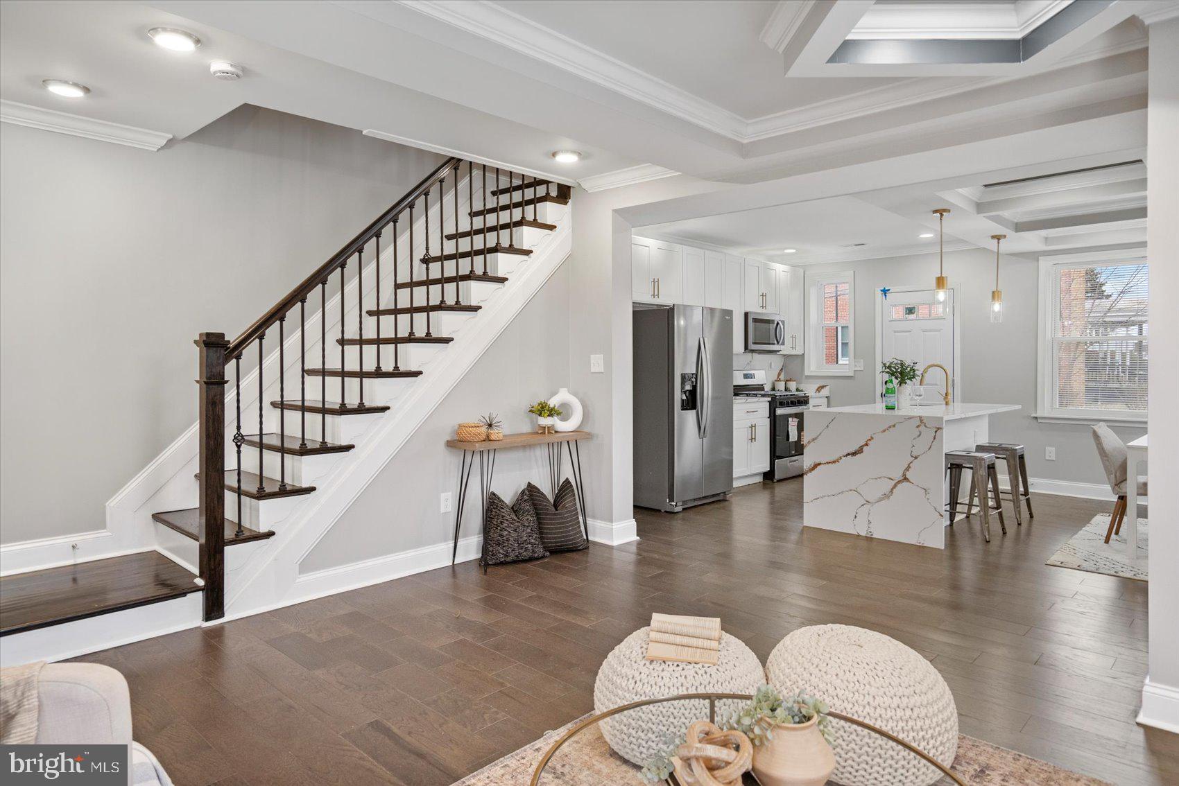 2901 Edison Highway Baltimore, MD 21213 - Photo 4 of 52 a view of livingroom with dining room and wooden floor