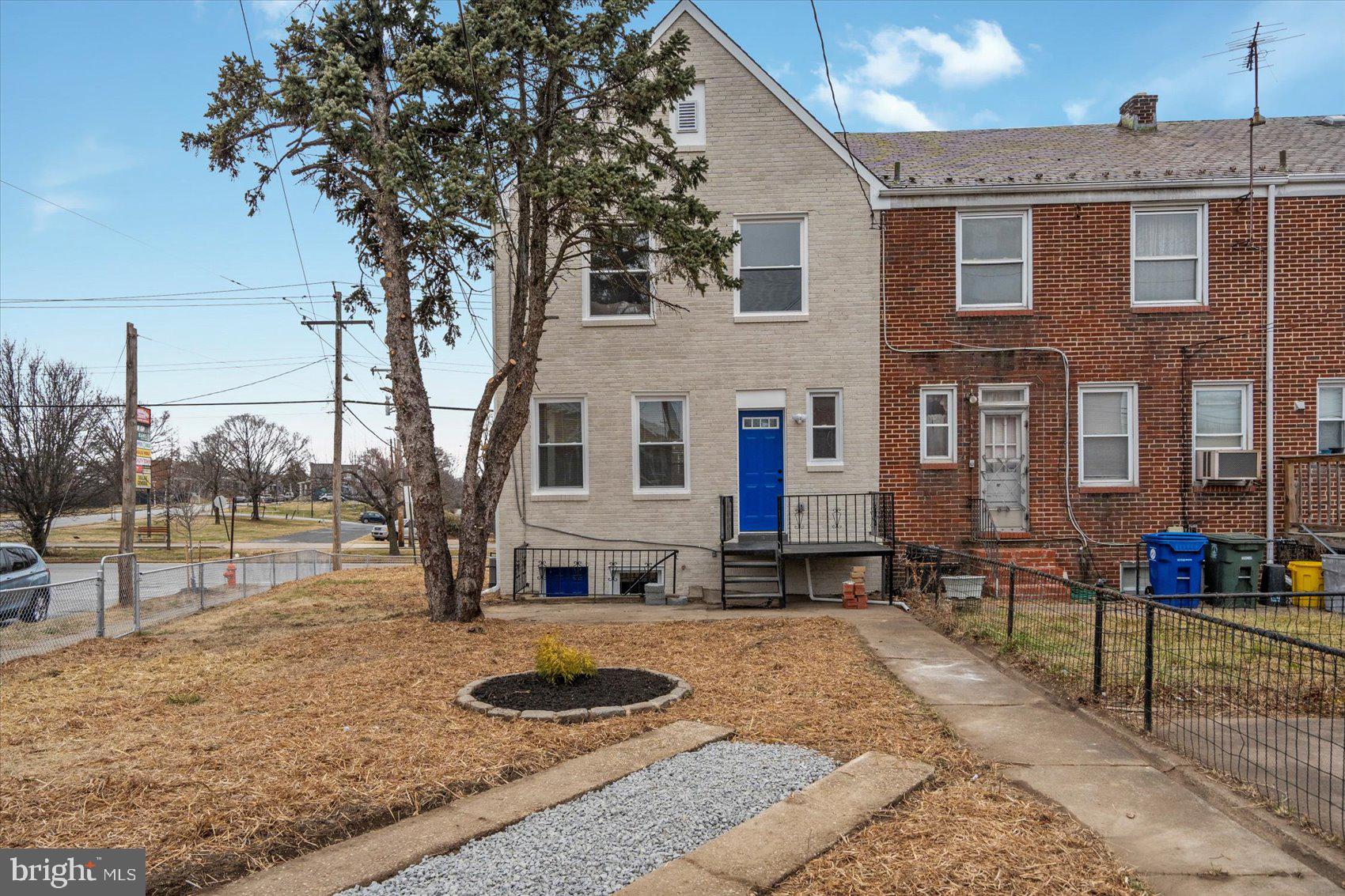 2901 Edison Highway Baltimore, MD 21213 - Photo 51 of 52 a front view of a house with garden