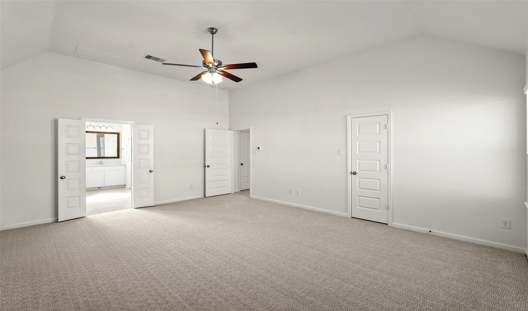 10609 Centre Green Way Houston, TX 77043 - Photo 11 of 27 an empty room with windows and fan