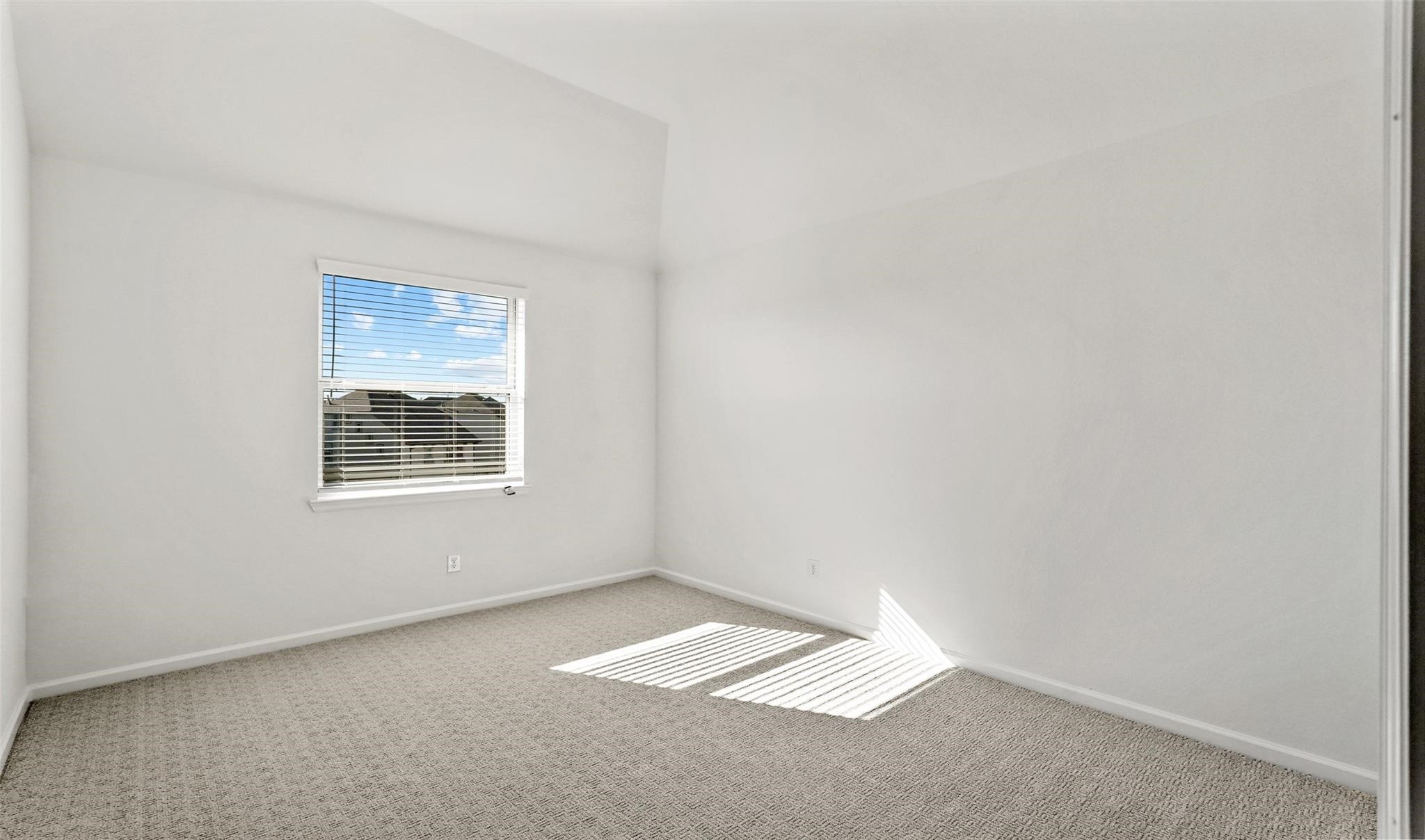 10609 Centre Green Way Houston, TX 77043 - Photo 17 of 27 an empty room with a window