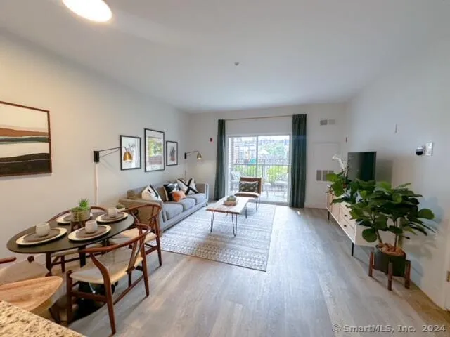 a view of a swimming pool with sitting area