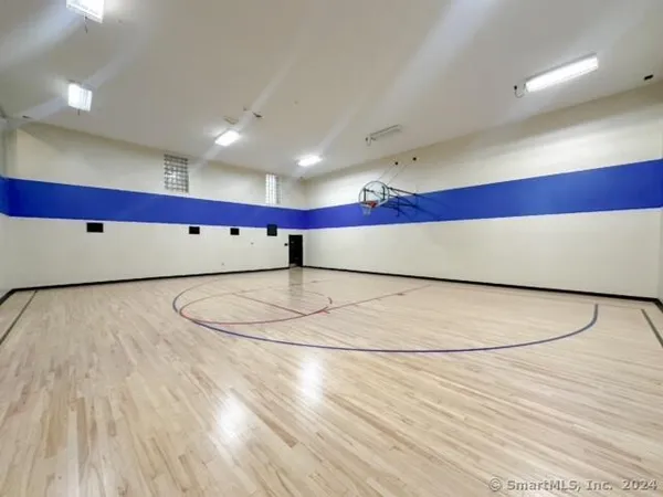 a swimming pool with outdoor seating and yard