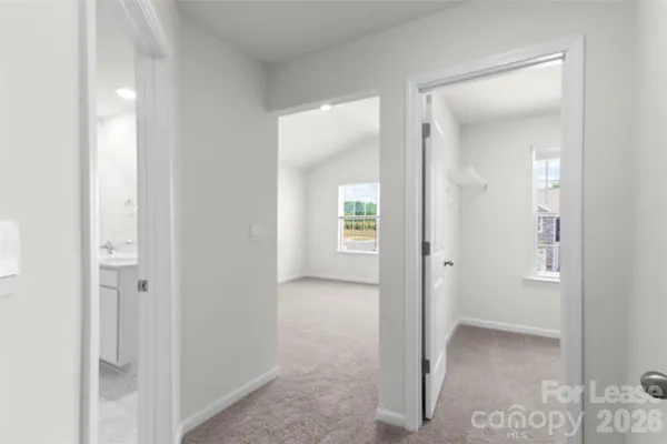a view of a livingroom from a hallway