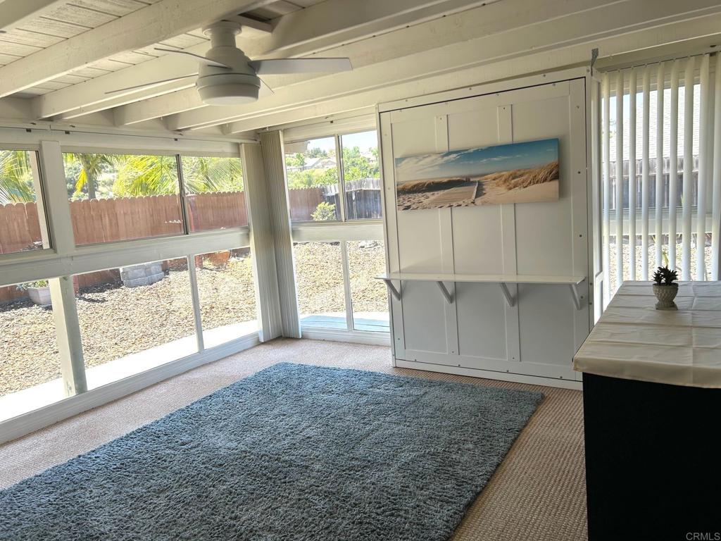 3594 Newland Road Oceanside, CA 92056 - Photo 21 of 44 a view of a kitchen with a sink and windows