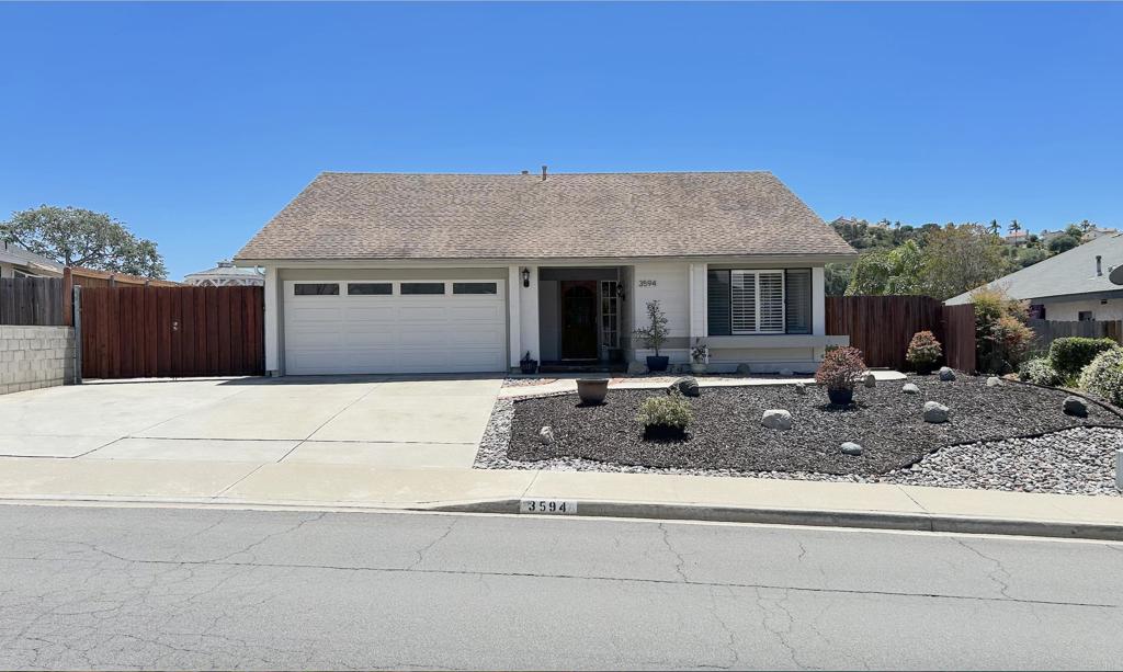 3594 Newland Road Oceanside, CA 92056 - Photo 3 of 44 a view of a house with a yard