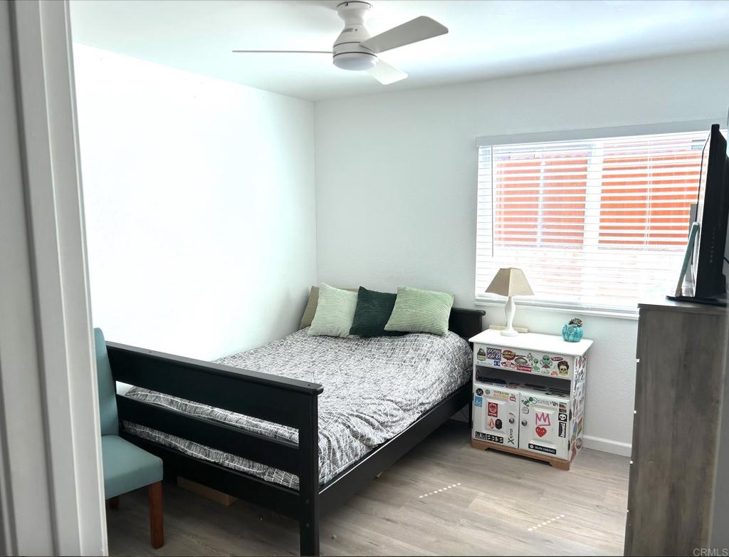 3594 Newland Road Oceanside, CA 92056 - Photo 32 of 44 a bedroom with a bed and a window