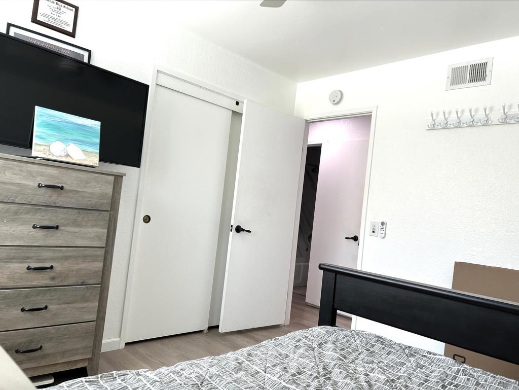 3594 Newland Road Oceanside, CA 92056 - Photo 33 of 44 a view of bedroom with a flat tv screen and dresser