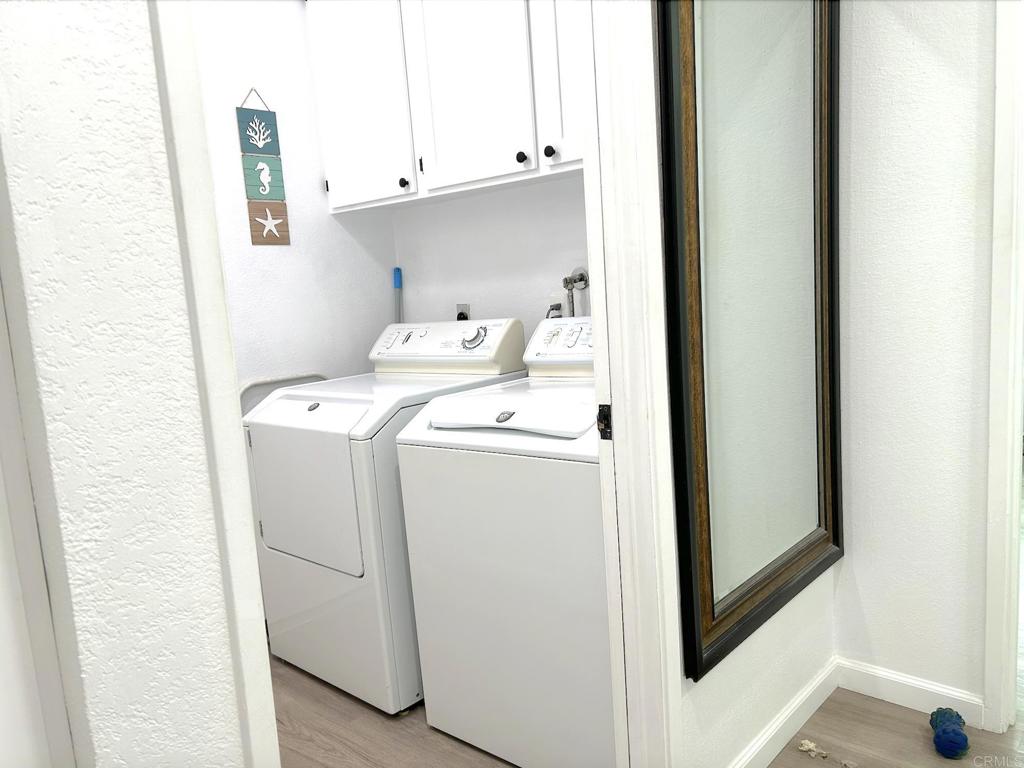 3594 Newland Road Oceanside, CA 92056 - Photo 36 of 44 a utility room with dryer and washer
