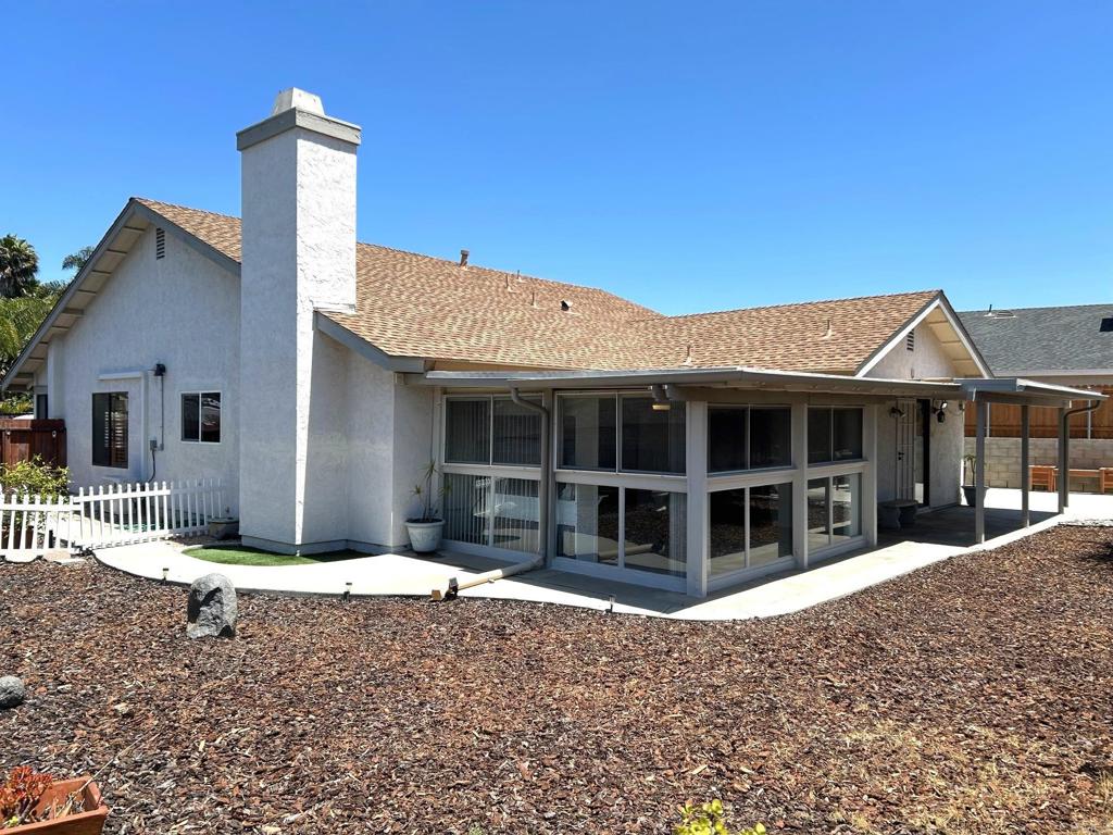 3594 Newland Road Oceanside, CA 92056 - Photo 42 of 44 a front view of a house with a outdoor space