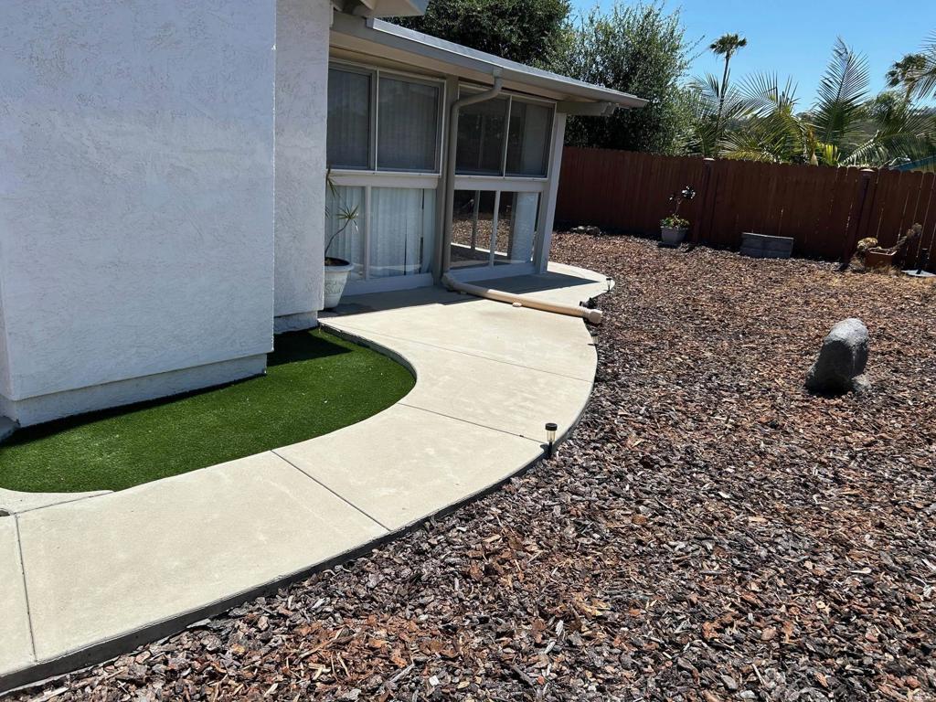 3594 Newland Road Oceanside, CA 92056 - Photo 43 of 44 a view of a house with a backyard