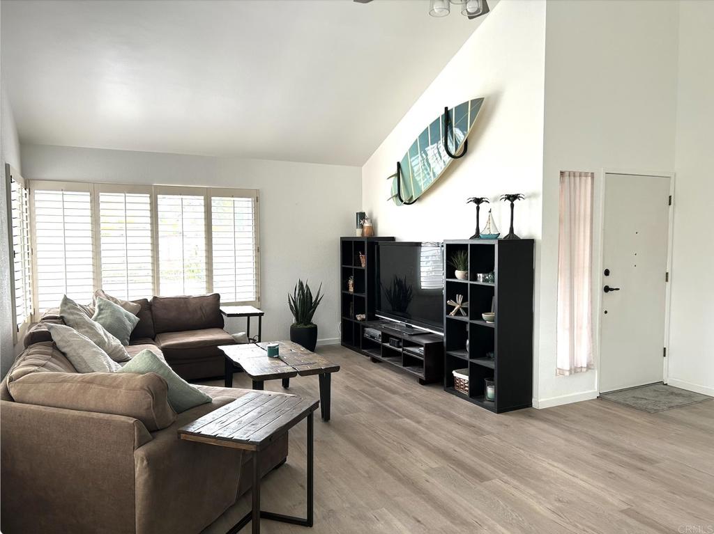 3594 Newland Road Oceanside, CA 92056 - Photo 10 of 44 a living room with furniture and a flat screen tv