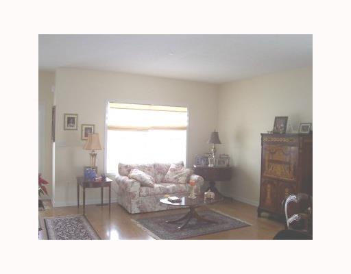 Living Room. HARDWOOD FLOORING OPENS TO DINING ROOM, 9 FT CEILINGS