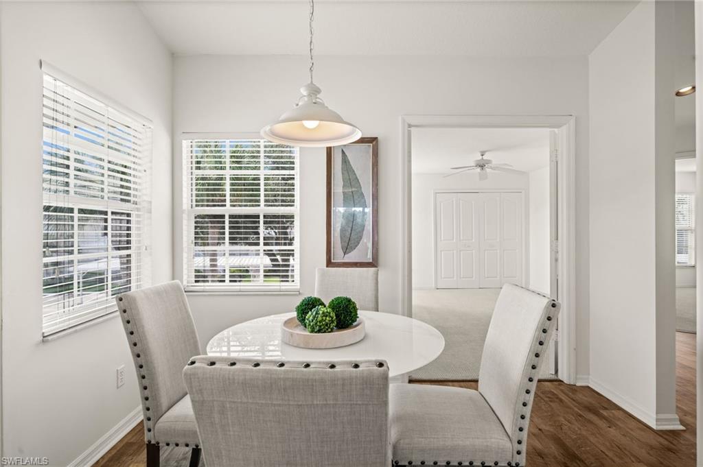 13100 Hamilton Harbour Drive, Unit G11 Naples, FL 34110 - Photo 13 of 32 a view of a dining room with furniture window and outside view