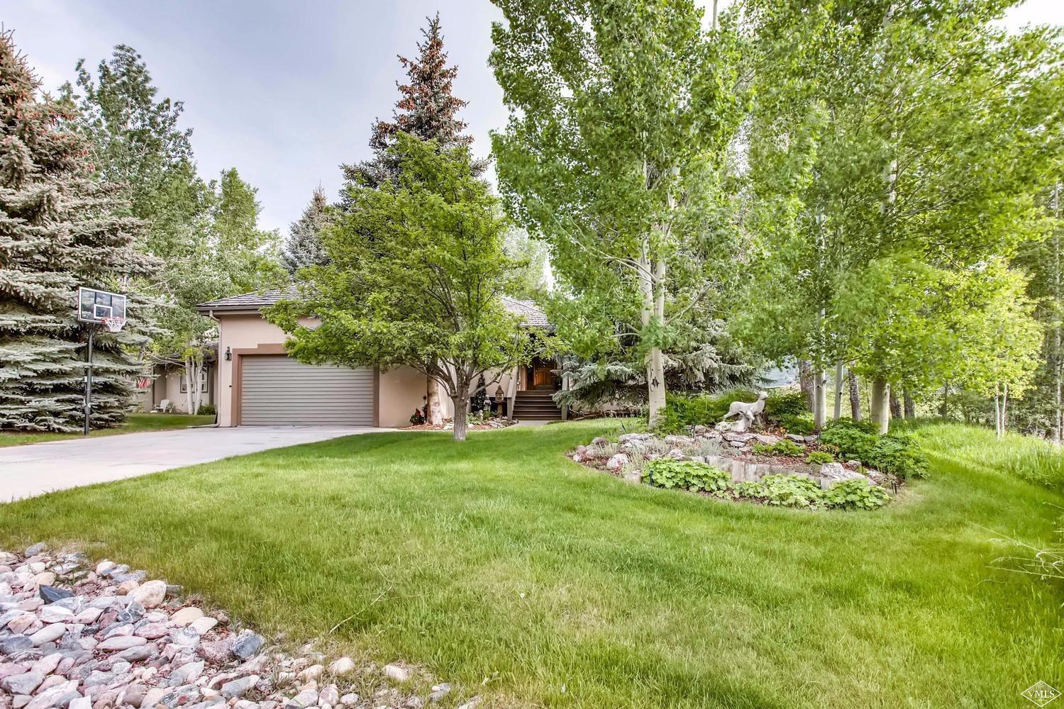 325 Rawhide Road Edwards, CO 81632 - Photo 1 of 23 Spacious front yard with mature trees.