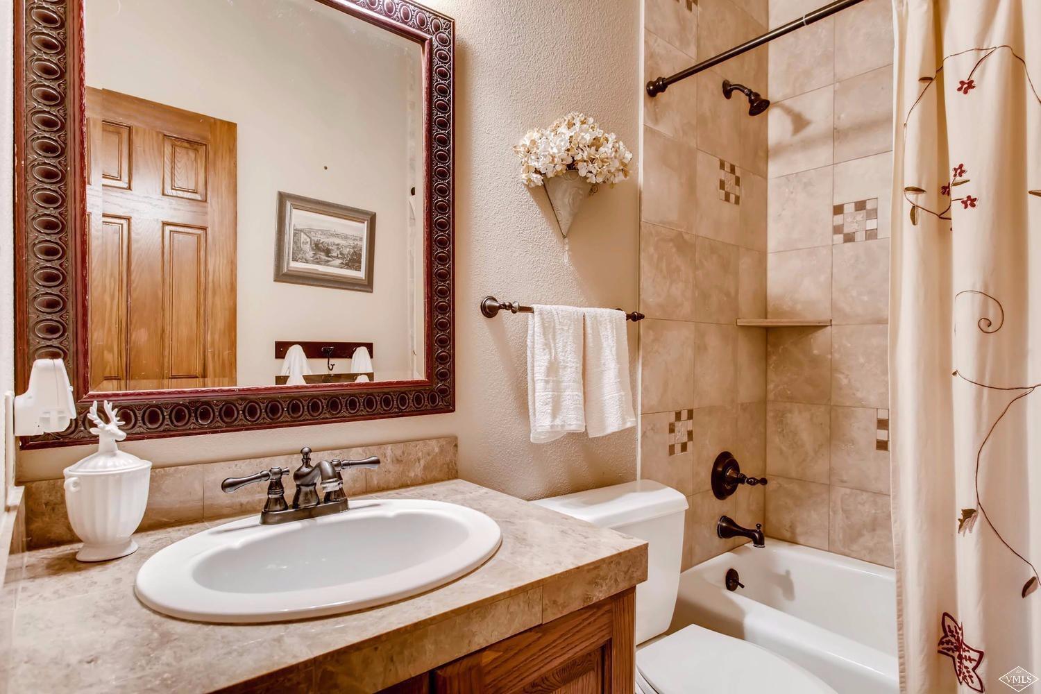 325 Rawhide Road Edwards, CO 81632 - Photo 18 of 23 Third bath en suite bath with custom til