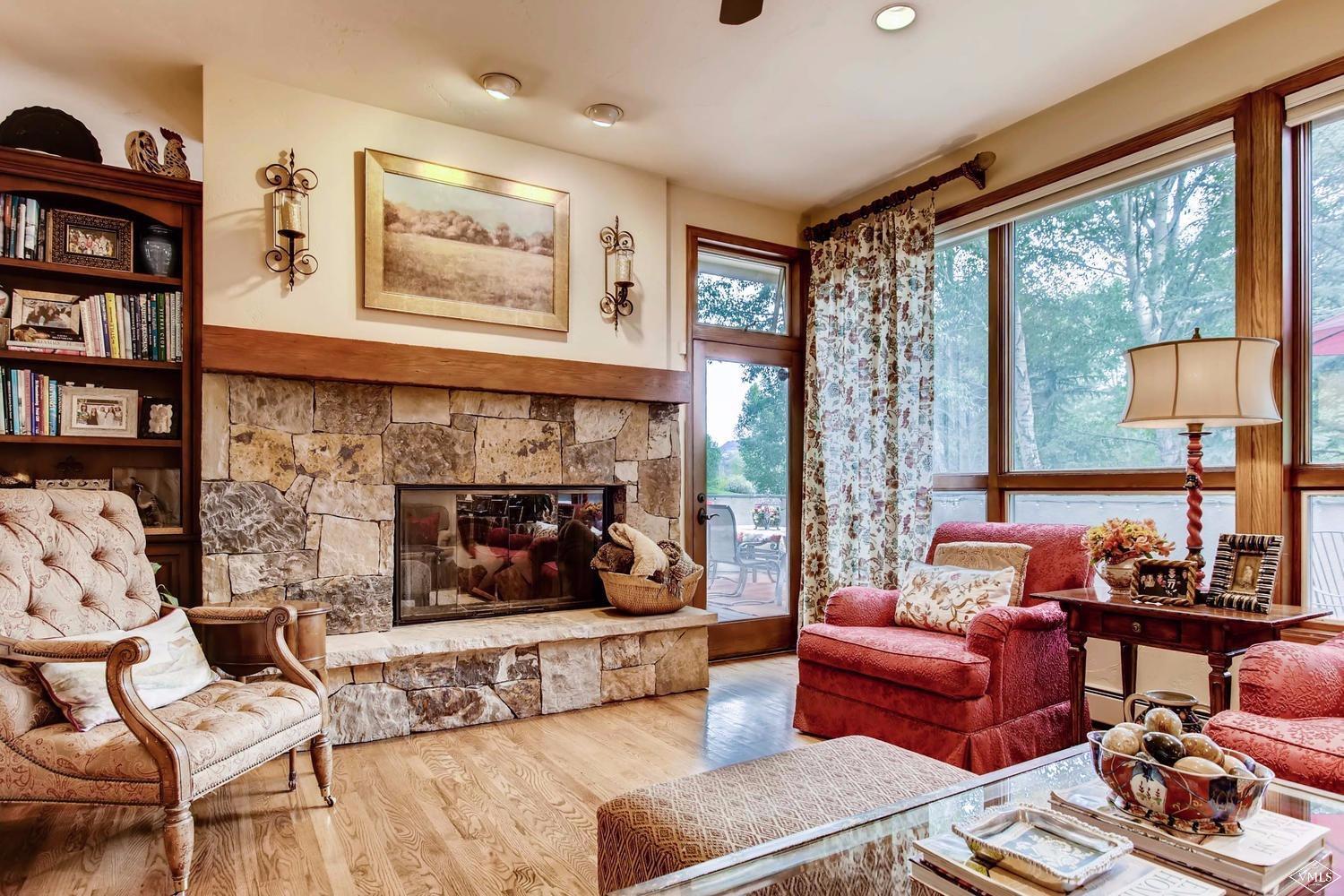 325 Rawhide Road Edwards, CO 81632 - Photo 4 of 23 Wood burning fireplace and access to dec