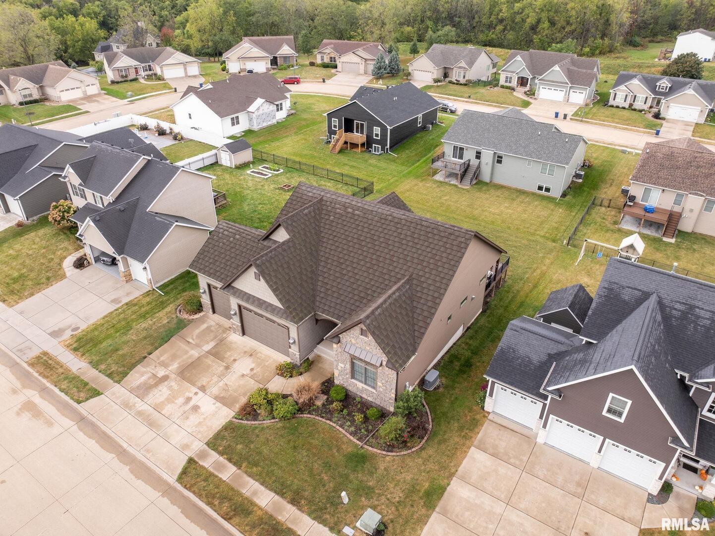 1422 Racine Court Davenport, IA 52804 - Photo 39 of 53 an aerial view of a house with garden space and street view