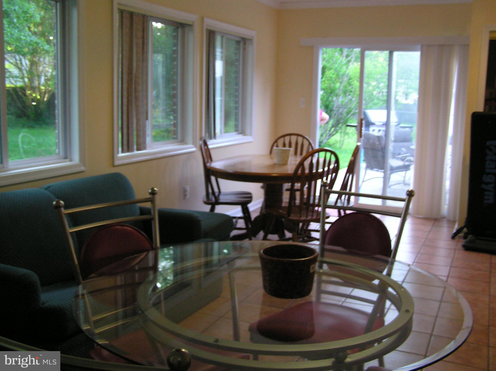 5405 Fremont Street Springfield, VA 22151 - Photo 17 of 30 Living Room Sun Room & Family Room