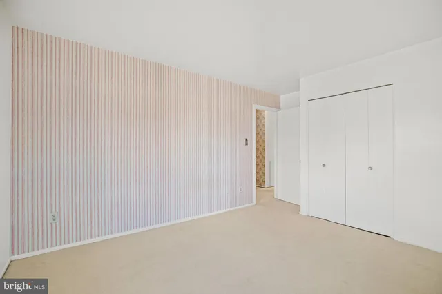 a view of a room with an empty space