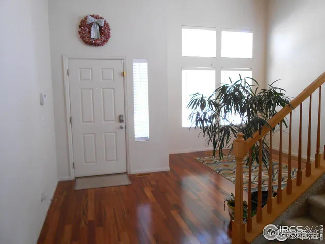 a view of entryway with a front door