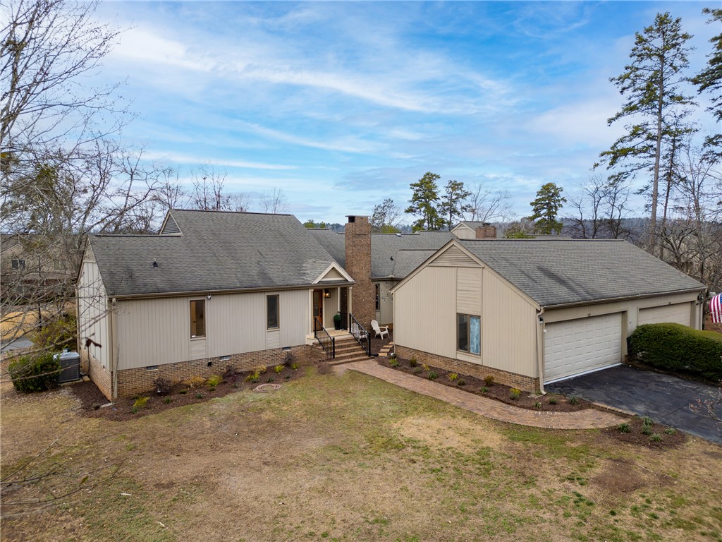 117 Riverpoint Drive Clemson, SC 29631 - Photo 35 of 47 This residence features a multi-car garage and a classic gable roof.