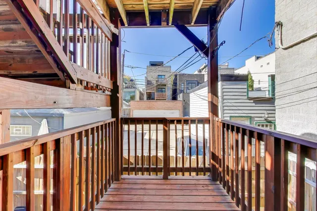 a view of stairs from a balcony