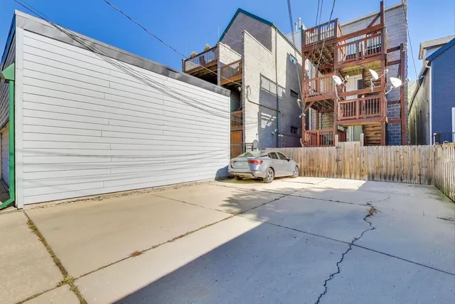 a view of a street with a house
