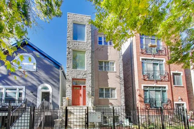 a front view of a multi story residential apartment building