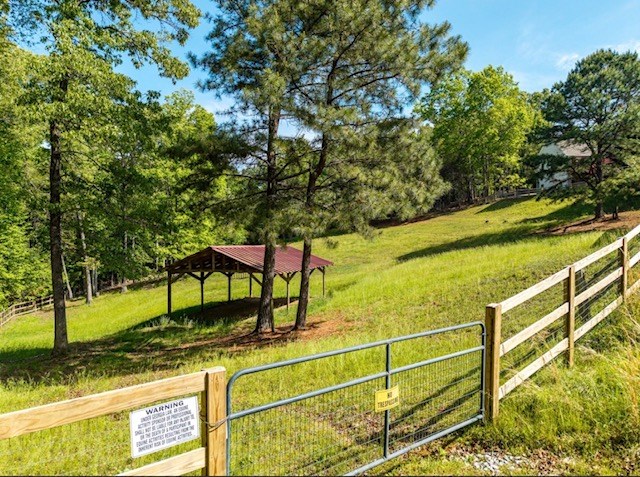 178 Windy Valley Lane Blue Ridge, GA 30513 - Photo 15 of 37 a view of a tennis ground with large trees