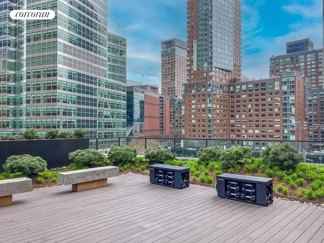 a view of a terrace with sitting area
